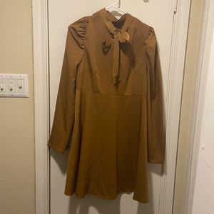 Tie neck long sleeve dress.